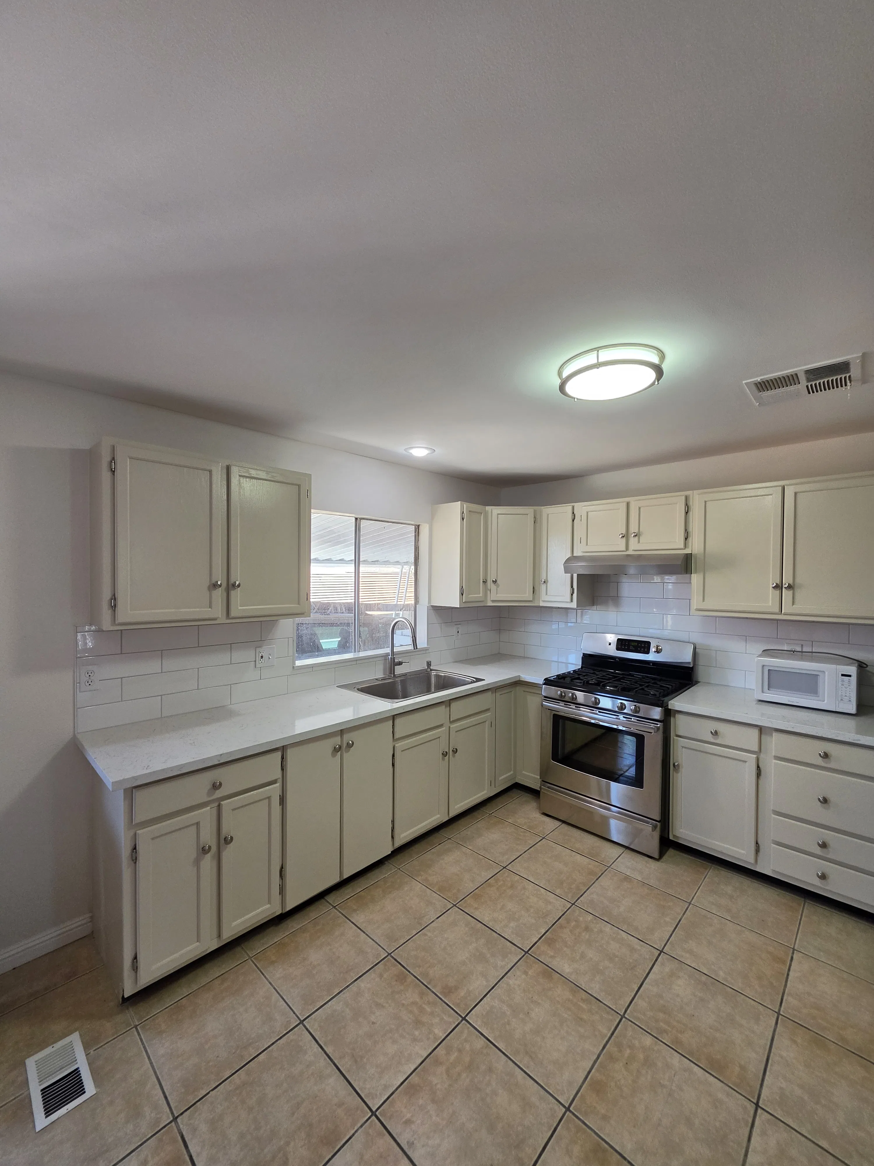 Project Full Home Remodel - Kitchen, Two Bathrooms, and Fresh Paint image