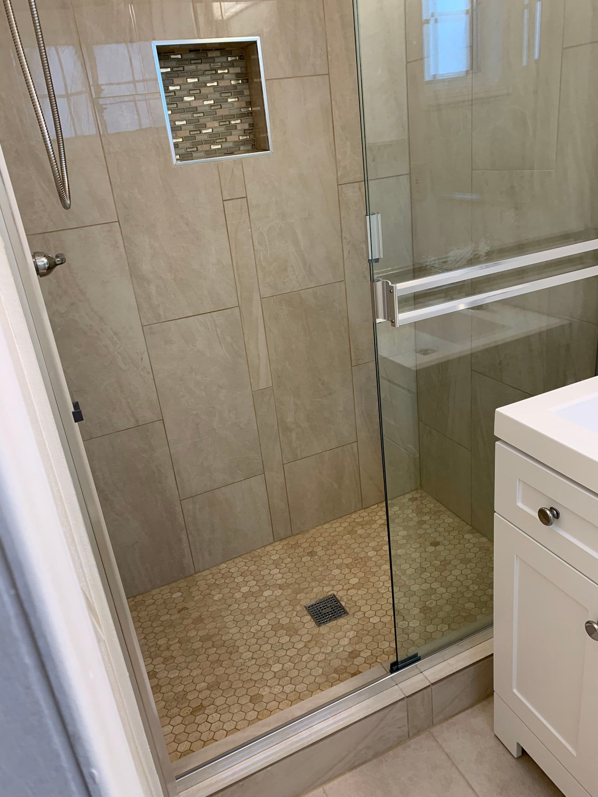 Project Modern Bathroom Remodel with Sleek Shower and White Vanity image
